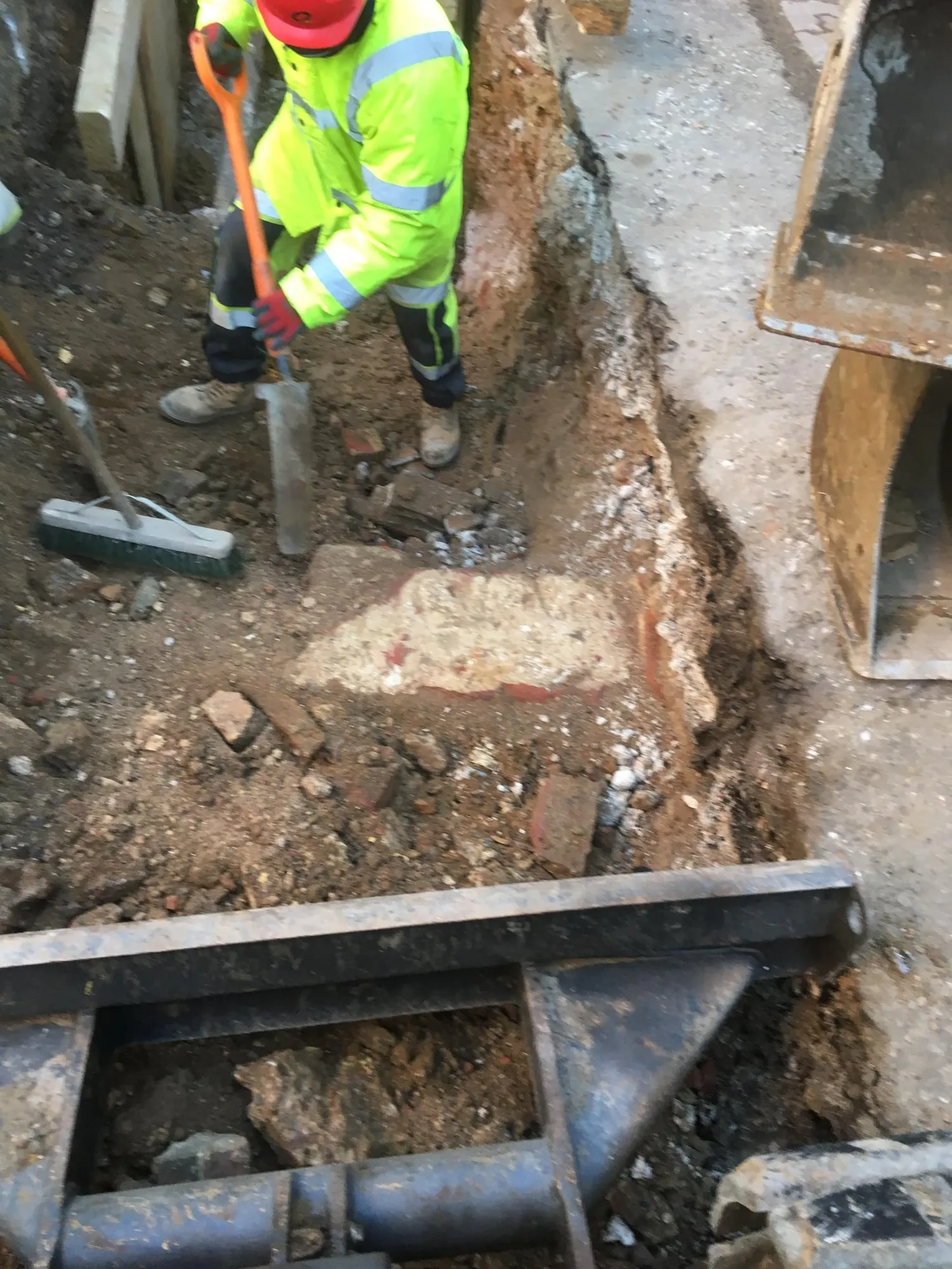 Timber trench support in a deep utility excavation